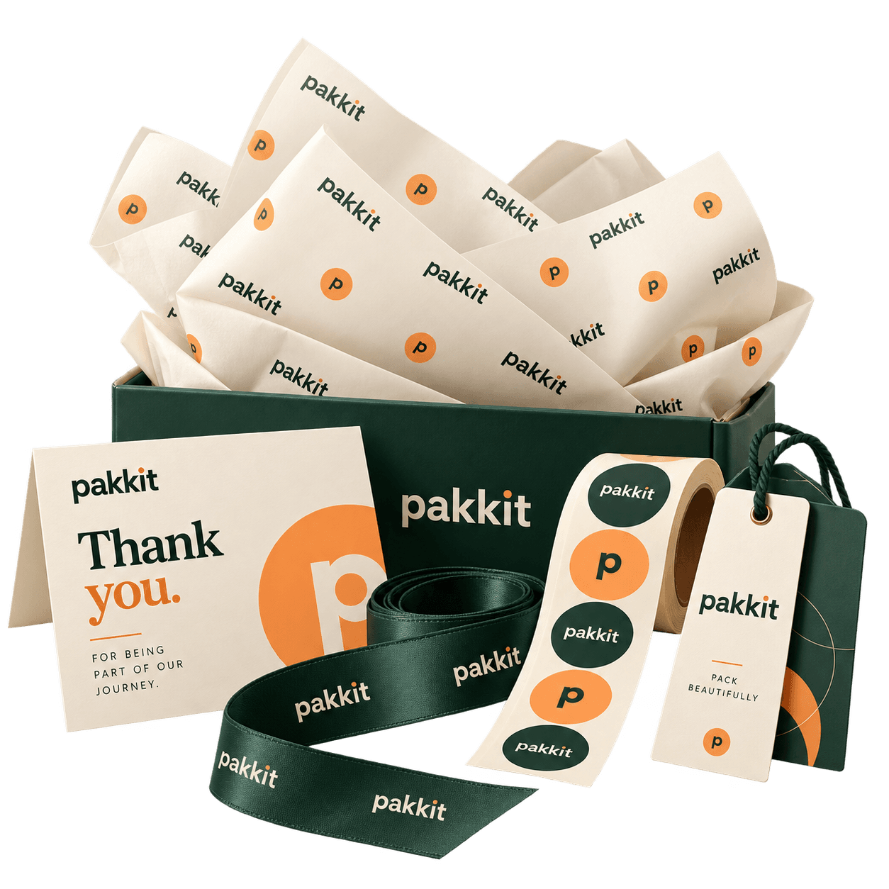 Pakkit branded tissue, stickers, ribbon, cards, and a paper bag
