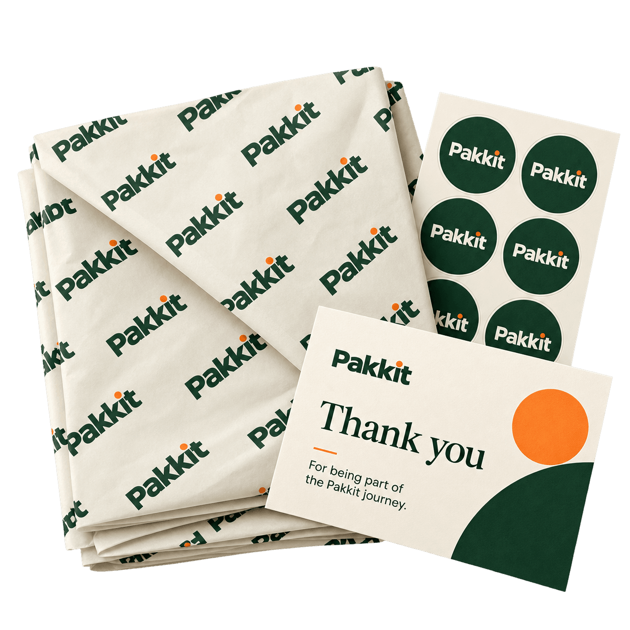 Printed tissue paper, green Pakkit seals, and a thank-you card